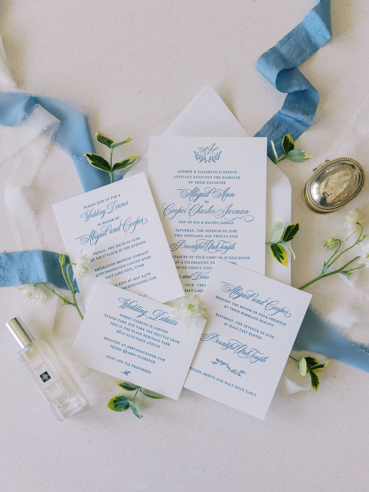 A vintage green Vespa scooter adorns a romantic garden wedding scene with flowers and a flowing long veil.