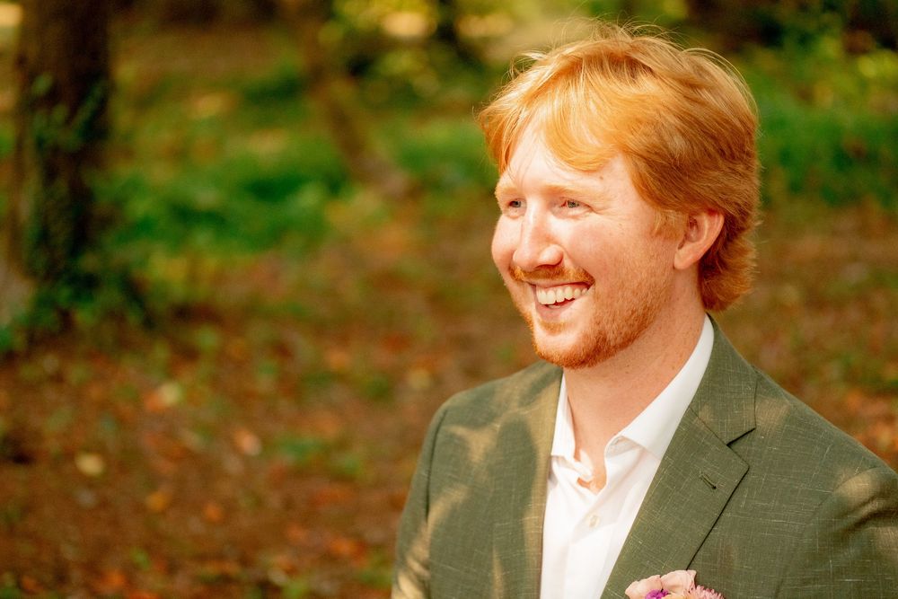 Joyful moments captured in an outdoor autumn setting with warm lighting.