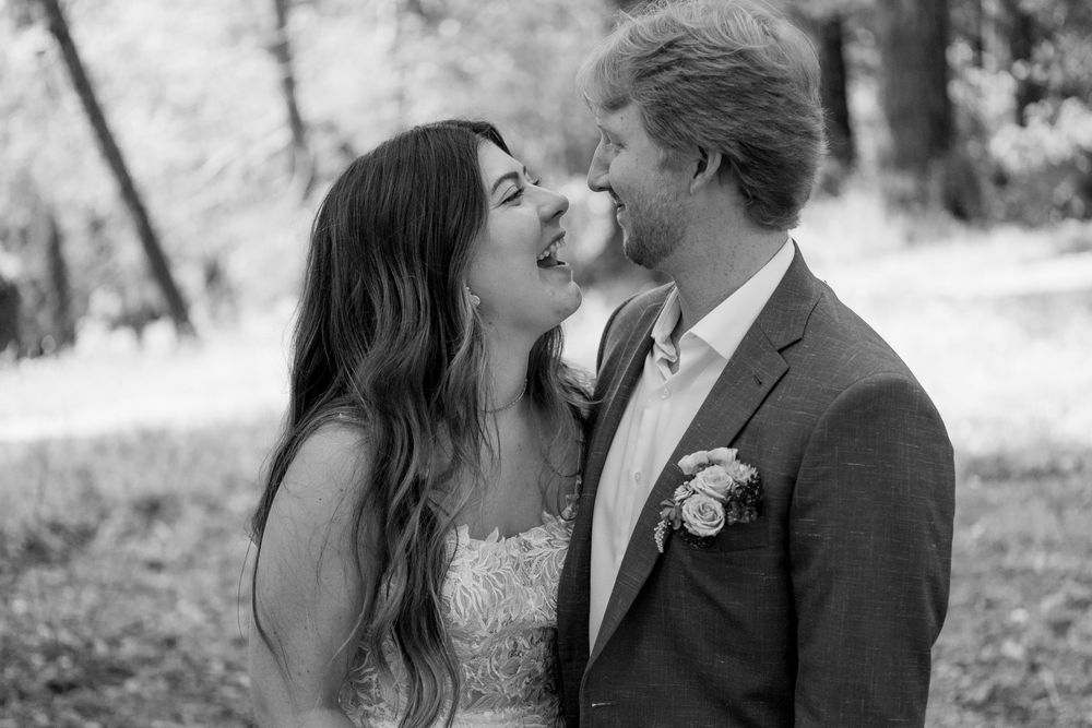Romantic black and white wedding portraits showing intimate moments between newlyweds.