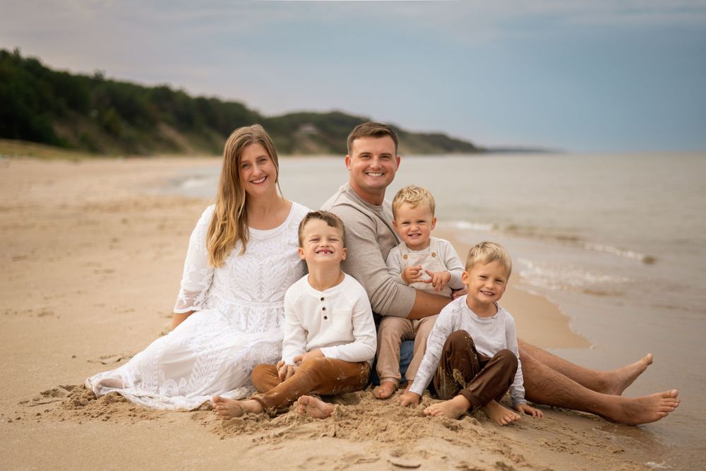 cute family on the beach of Lake Michigan, golden hour photography, family photography, photo with kids