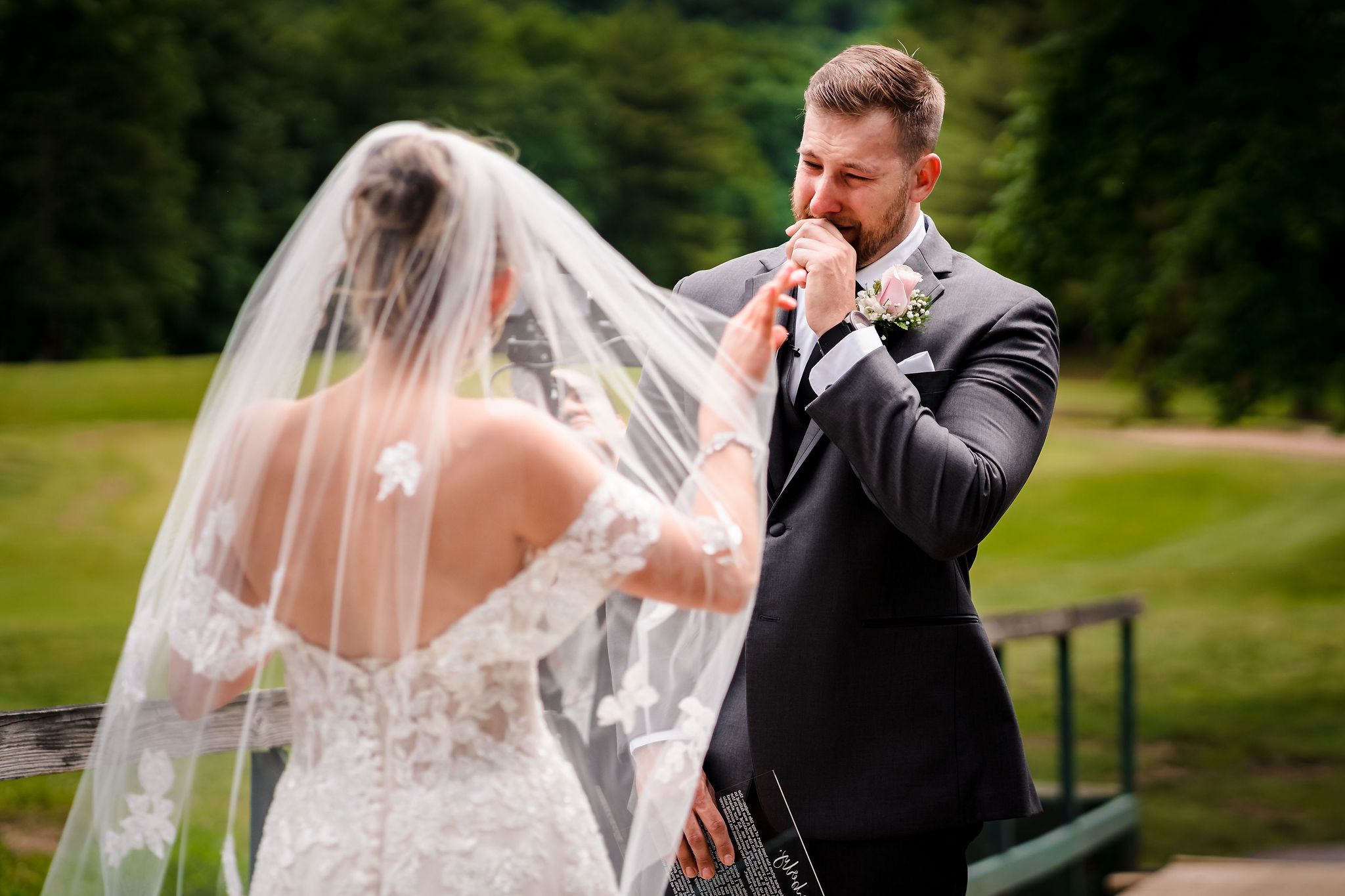 Romantic outdoor wedding portraits captured in a lush garden setting.