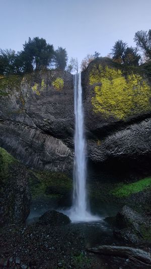 Latourell Falls cascading down a cliff in the Columbia River Gorge, Oregon.