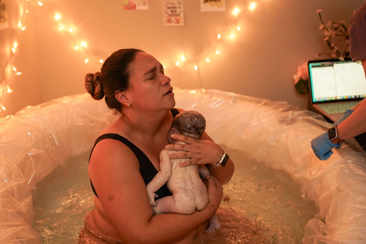 Birth photography, labor and delivery, documentary style, intimate moments, newborn arrival, DeLand FL photographer, authentic home birth