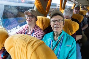 Photo of men on tour bus taking a holy land tour in Israel