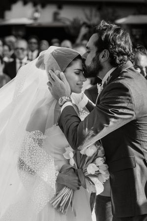 A romantic sequence of wedding photos showing kisses between a bride in white and groom in dark suit during their ceremony.