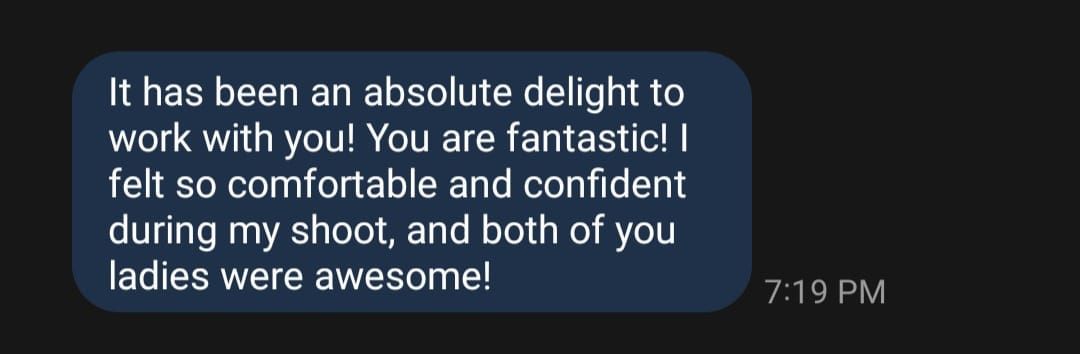 A dark themed mobile text message showing a positive review message with white text on a blue chat bubble at 7:19 PM.