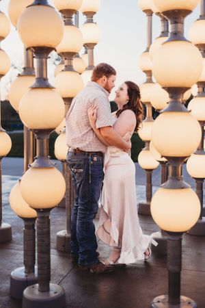 Engagement session at water works park in front of the constellation lights