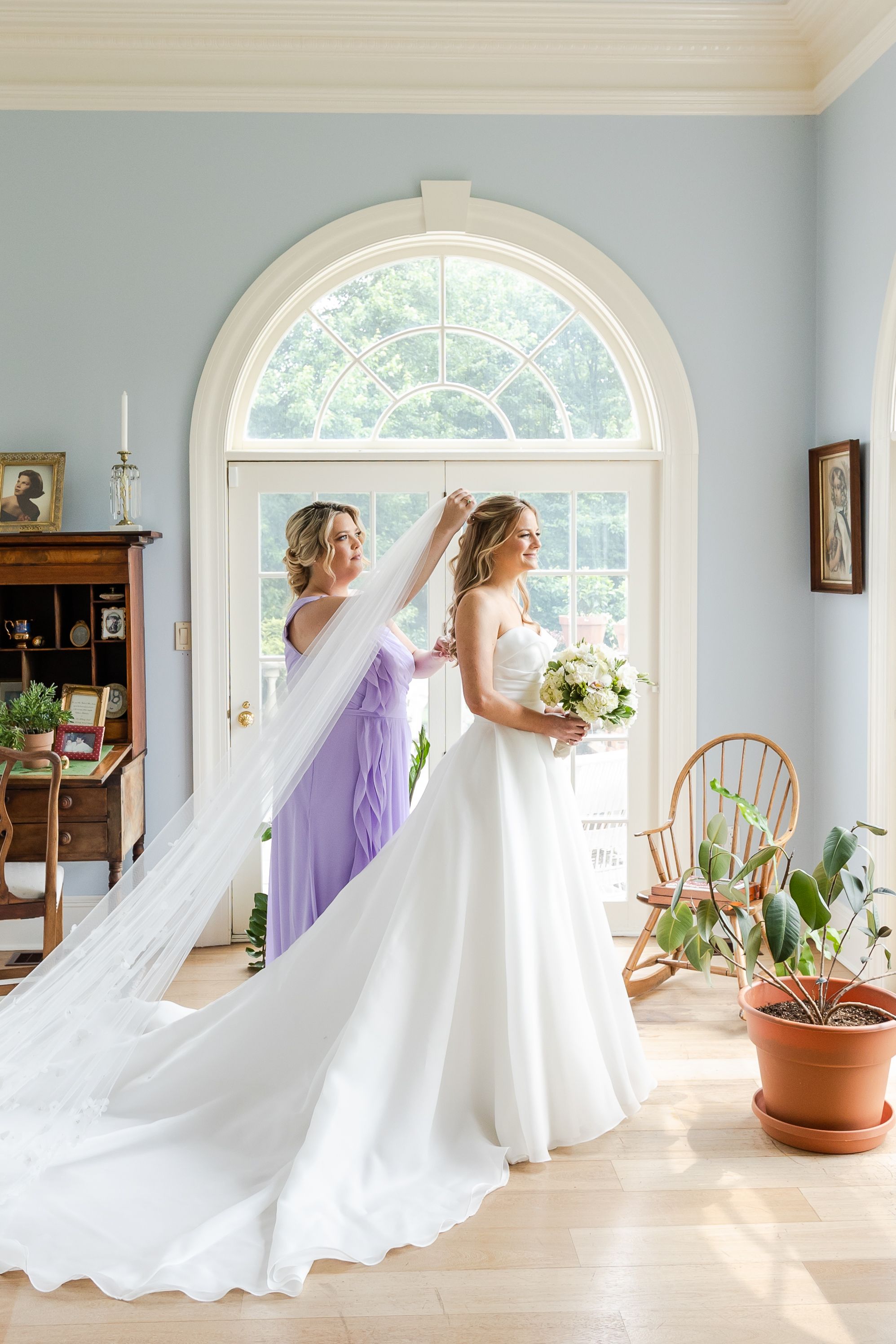 Sequence of wedding dress photos in a bright interior room with arched windows and flowing white gown.