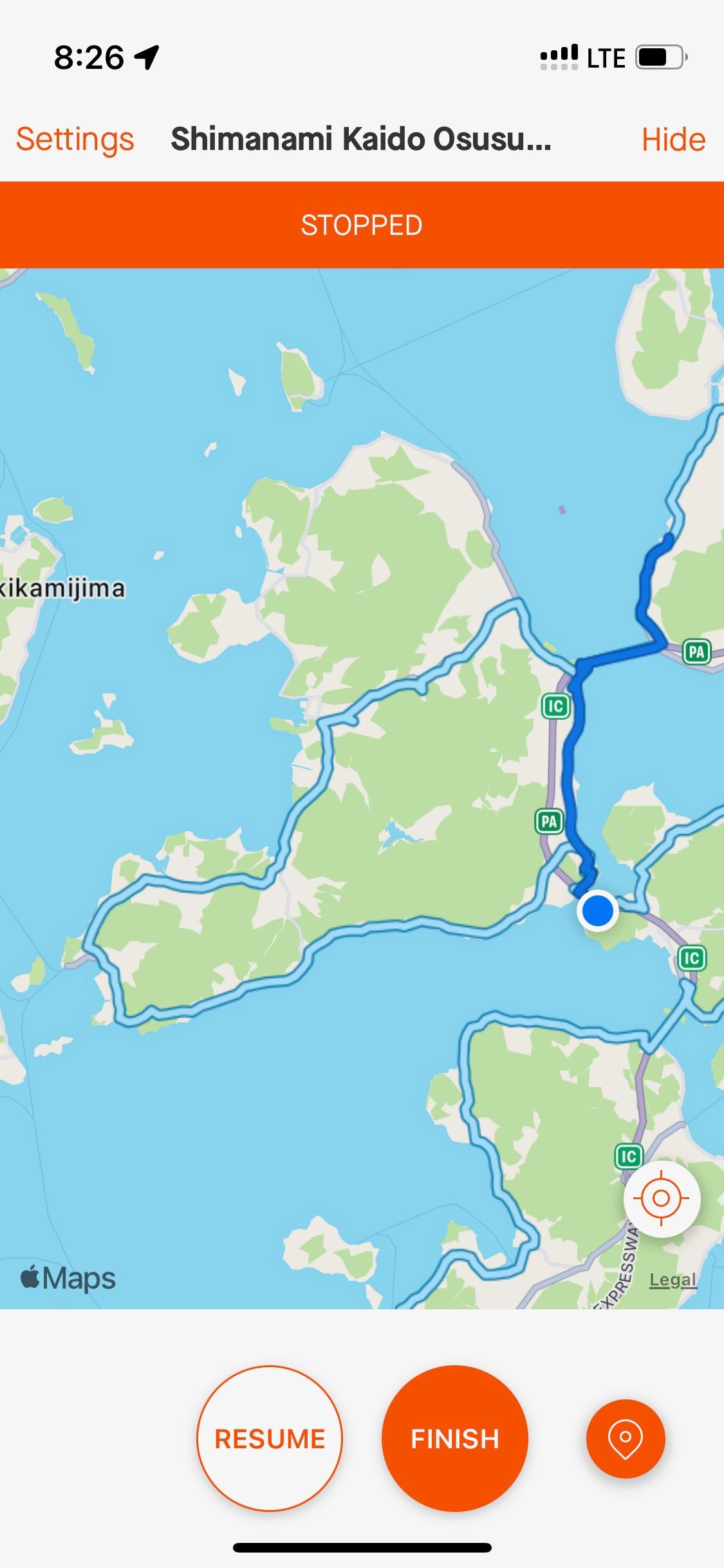 Navigation map interface showing blue route lines and location markers on a coastal area.