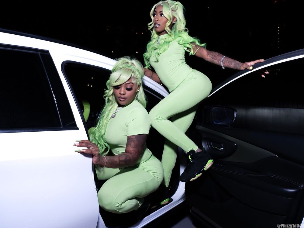 Fashion photo series showing dynamic poses in neon green outfit by white car.