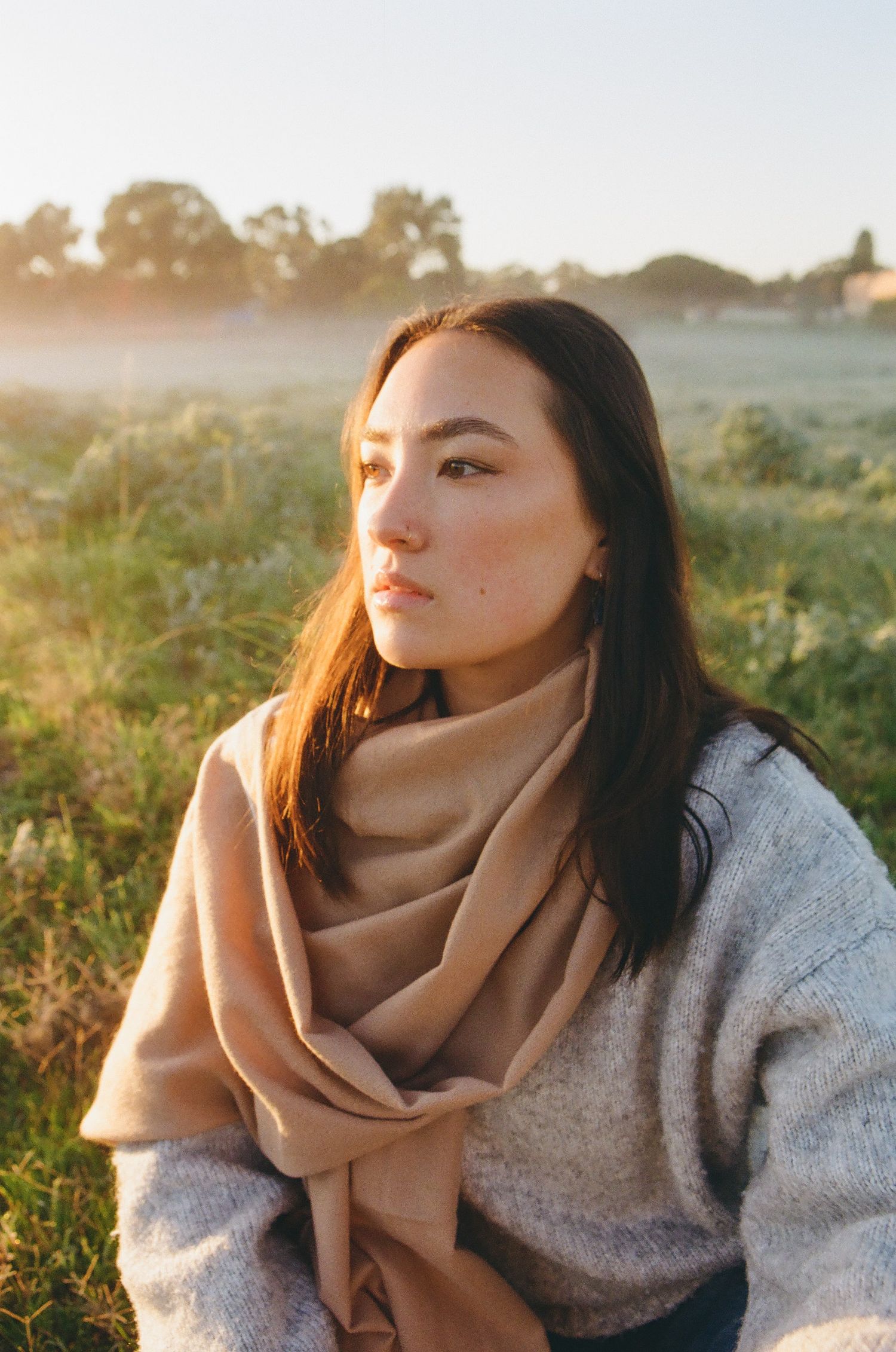 Capturing authentic moments through film in Perth, WA. Intimate film portrait at Randwick Stables, soft morning light