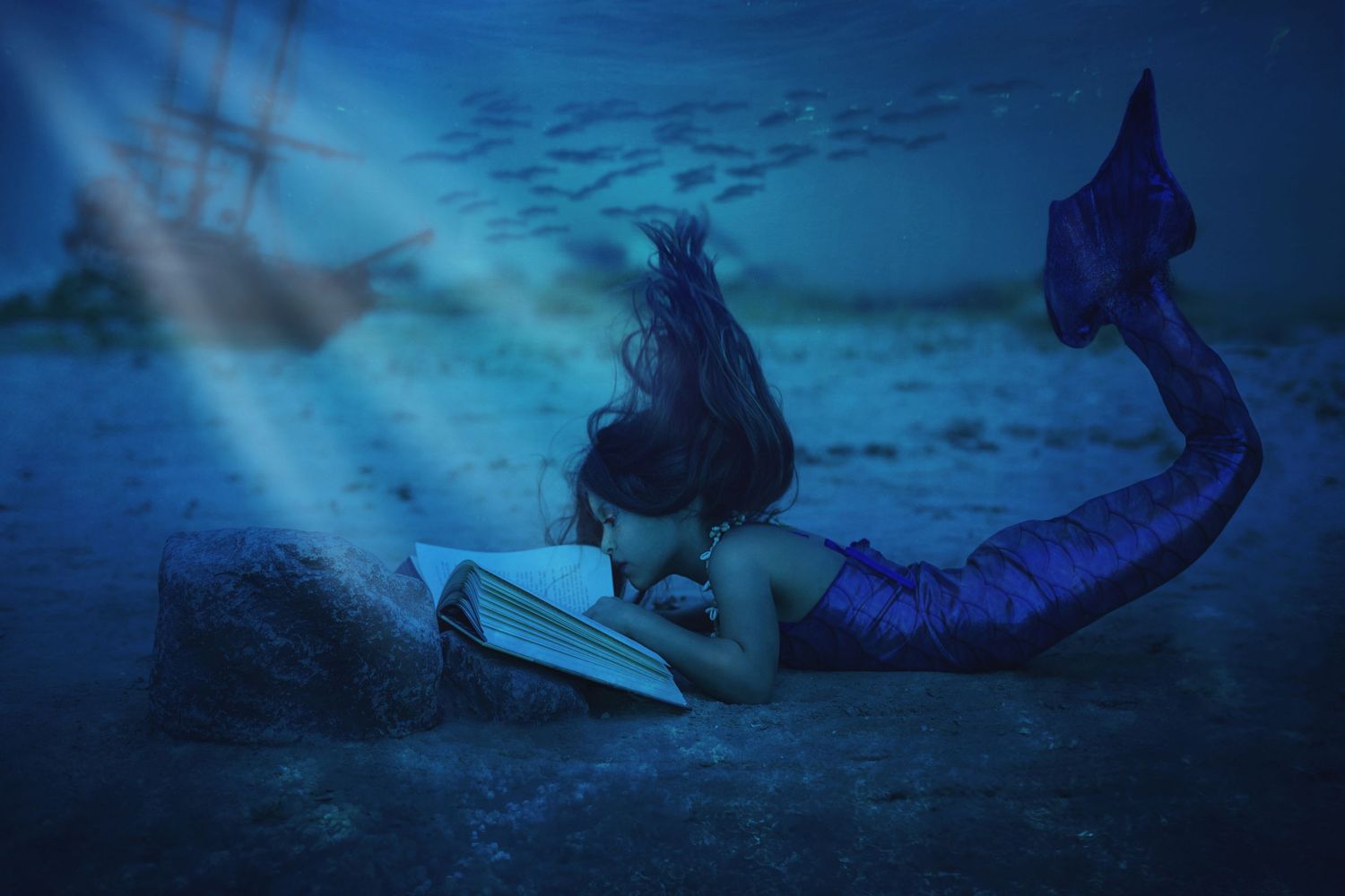 little mermaid at utah lake underwater reading