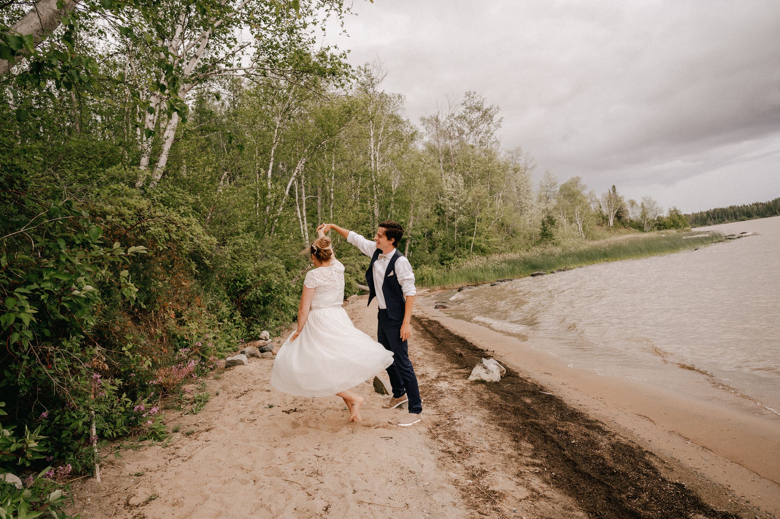 A wedding photo collage showing multiple beach ceremony and portrait shots with dramatic cloudy skies.