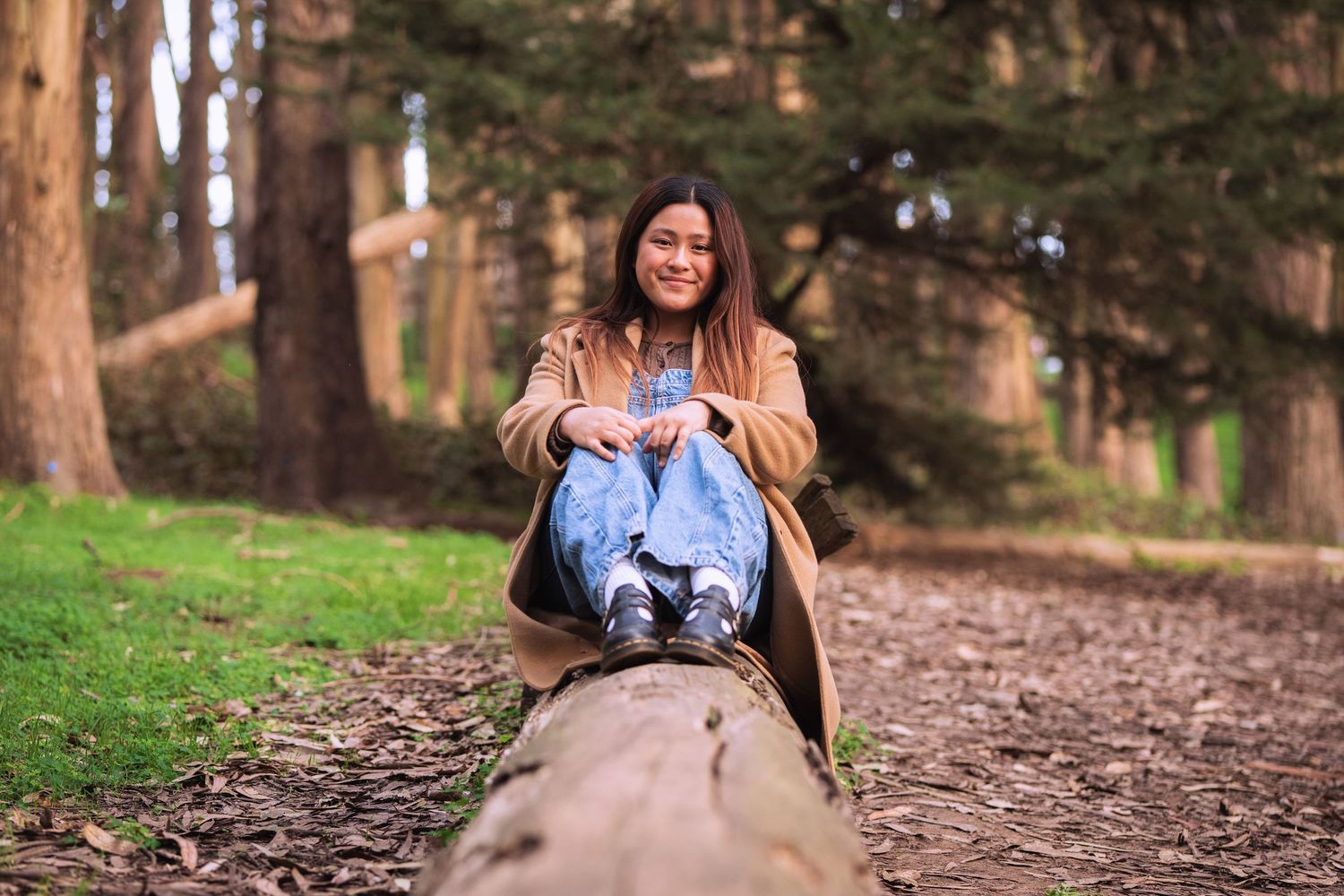 Candid moments captured on a forest trail during golden hour.