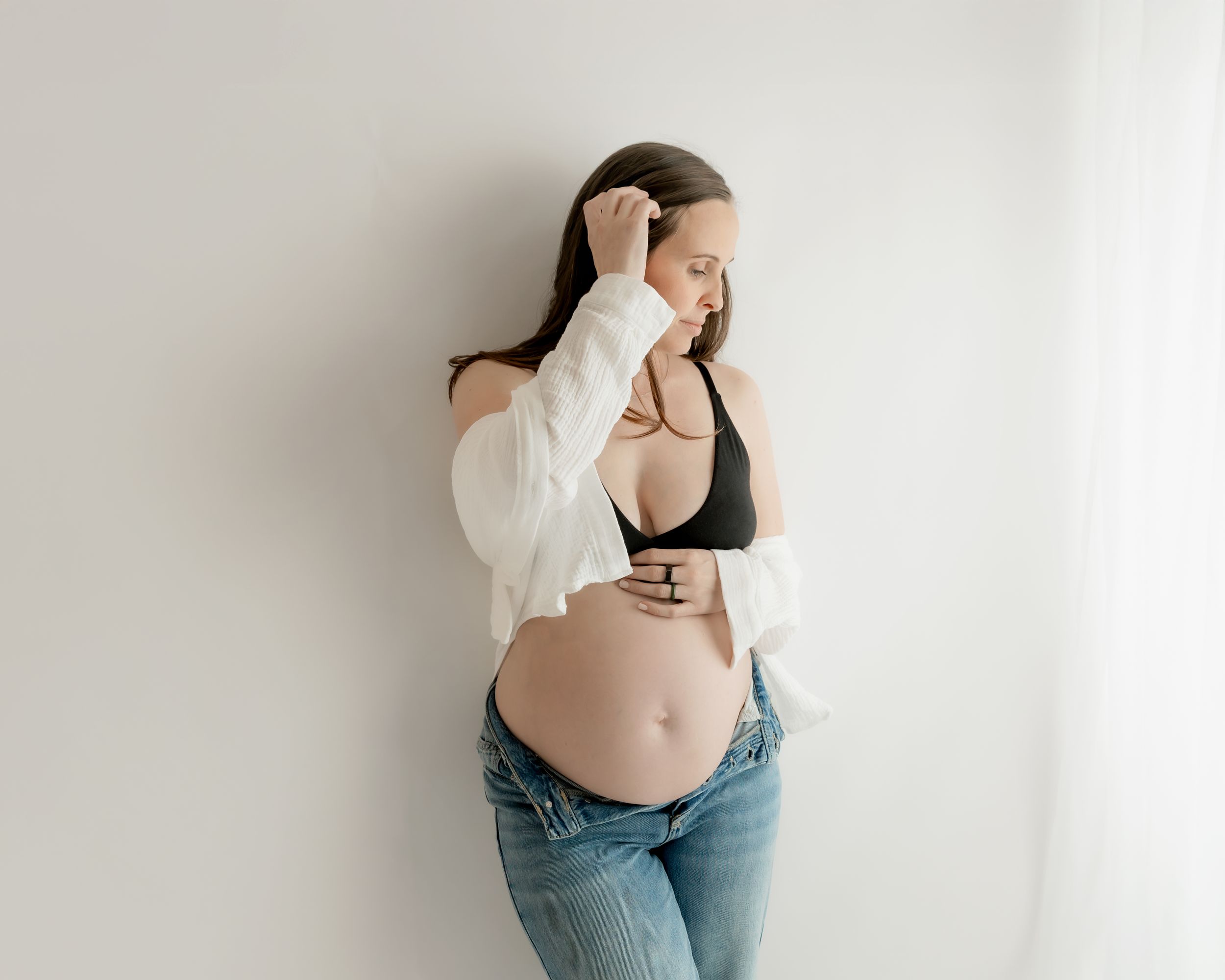 Studio maternity portrait with timeless, minimalist styling