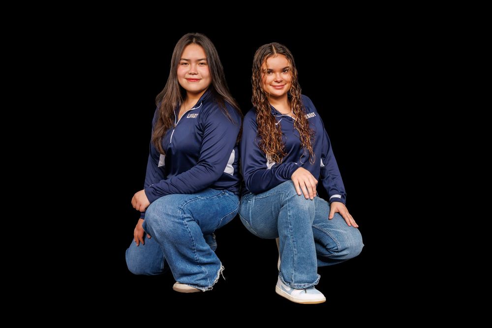 A sequence of dance moves showing legs in blue jeans and sneakers performing a choreographed routine.