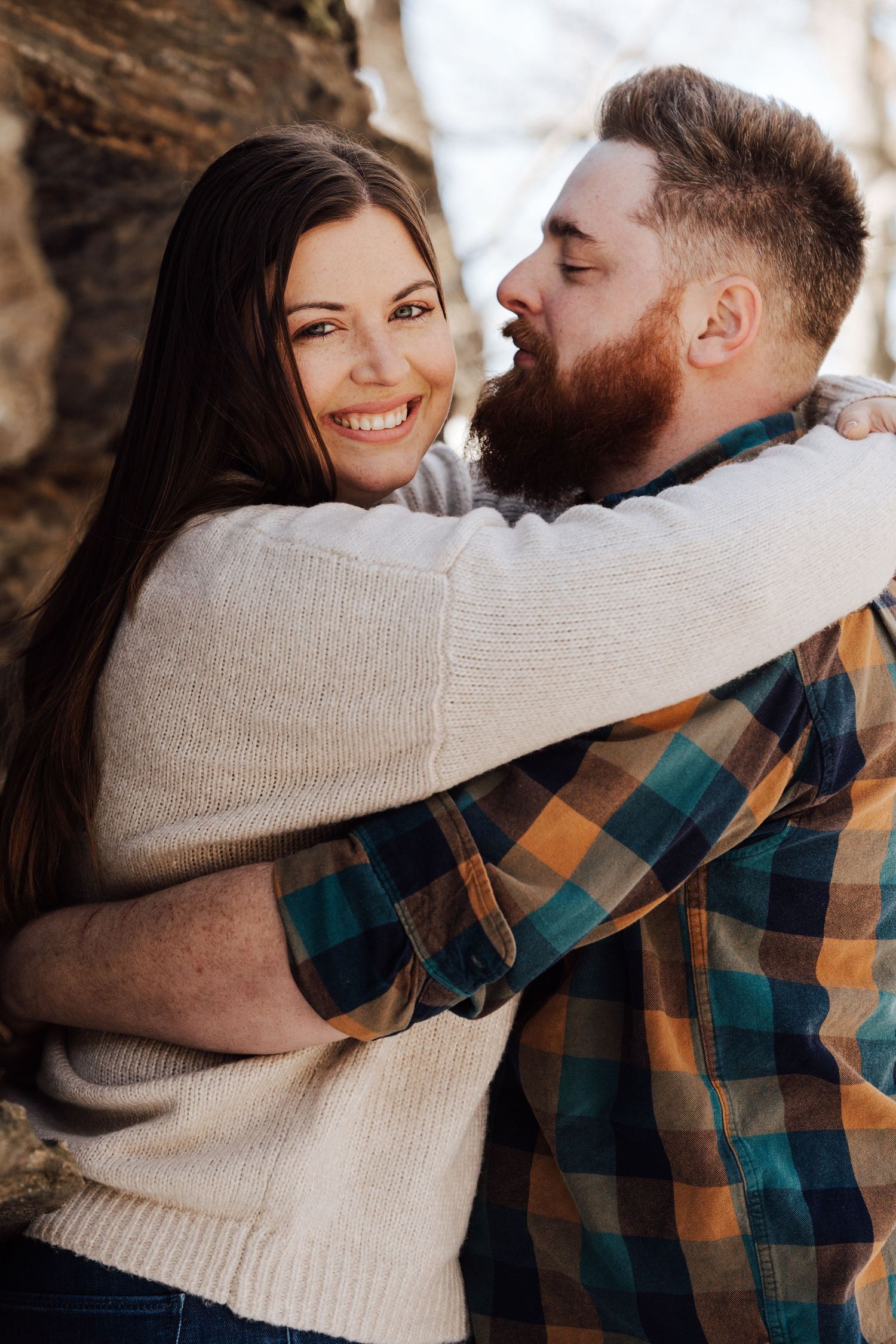 A couple in casual winter attire share an intimate engagement photoshoot in Lancaster county, Pequea PA.