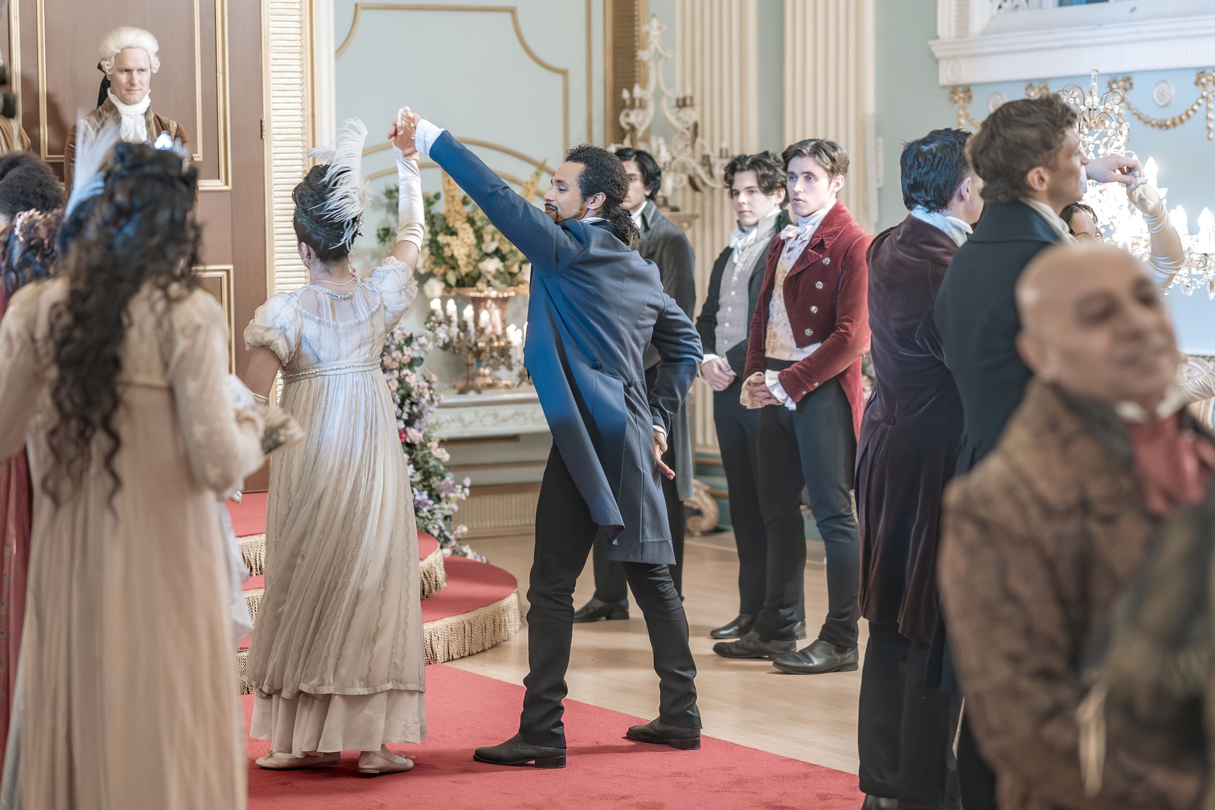 Bridgerton at Newark Town Hall in Nottinghamshire, photographed behind the scenes for the Netflix production. Dancers in ballroom attire.