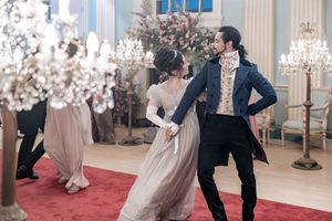 Bridgerton at Newark Town Hall in Nottinghamshire, photographed behind the scenes for the Netflix production. couple ballroom dancing.