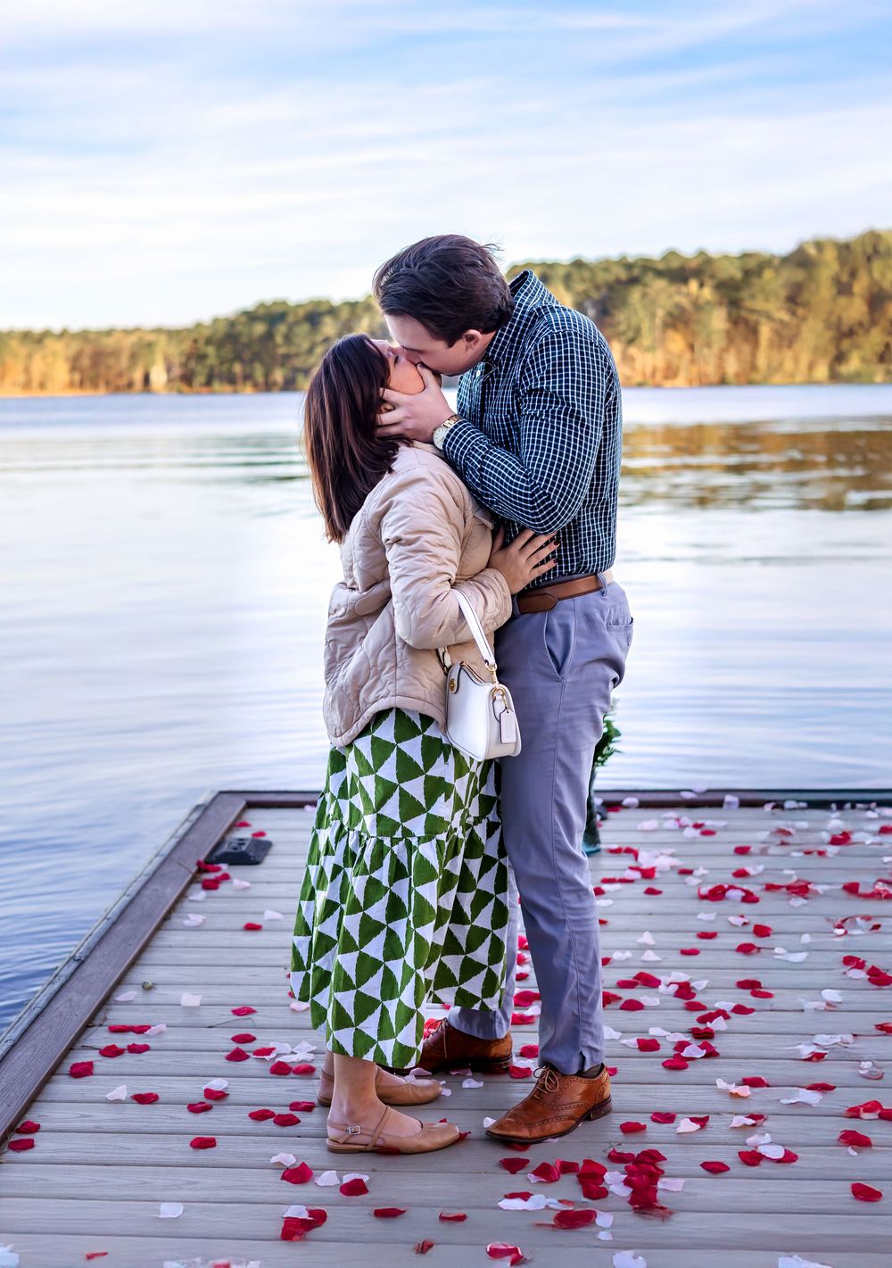 Surprise proposal at The Ritz-Carlton Reynolds Lake Oconee on the dock at sunset photographed by Athens GA photographer