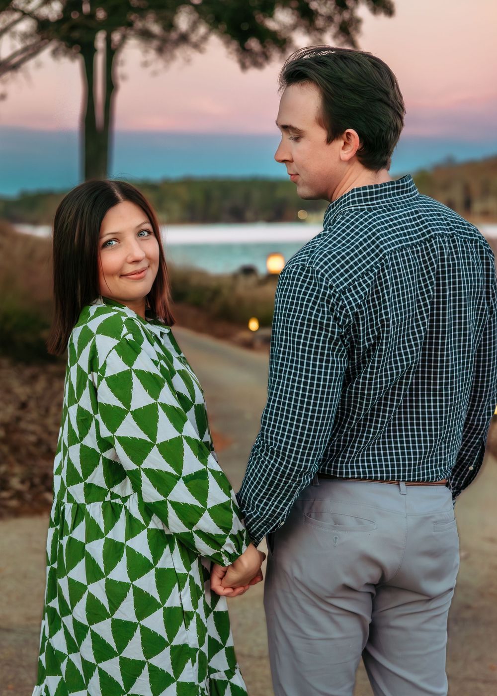 Sunset engagement photos on dock at The Ritz-Carlton Reynolds Lake Oconee