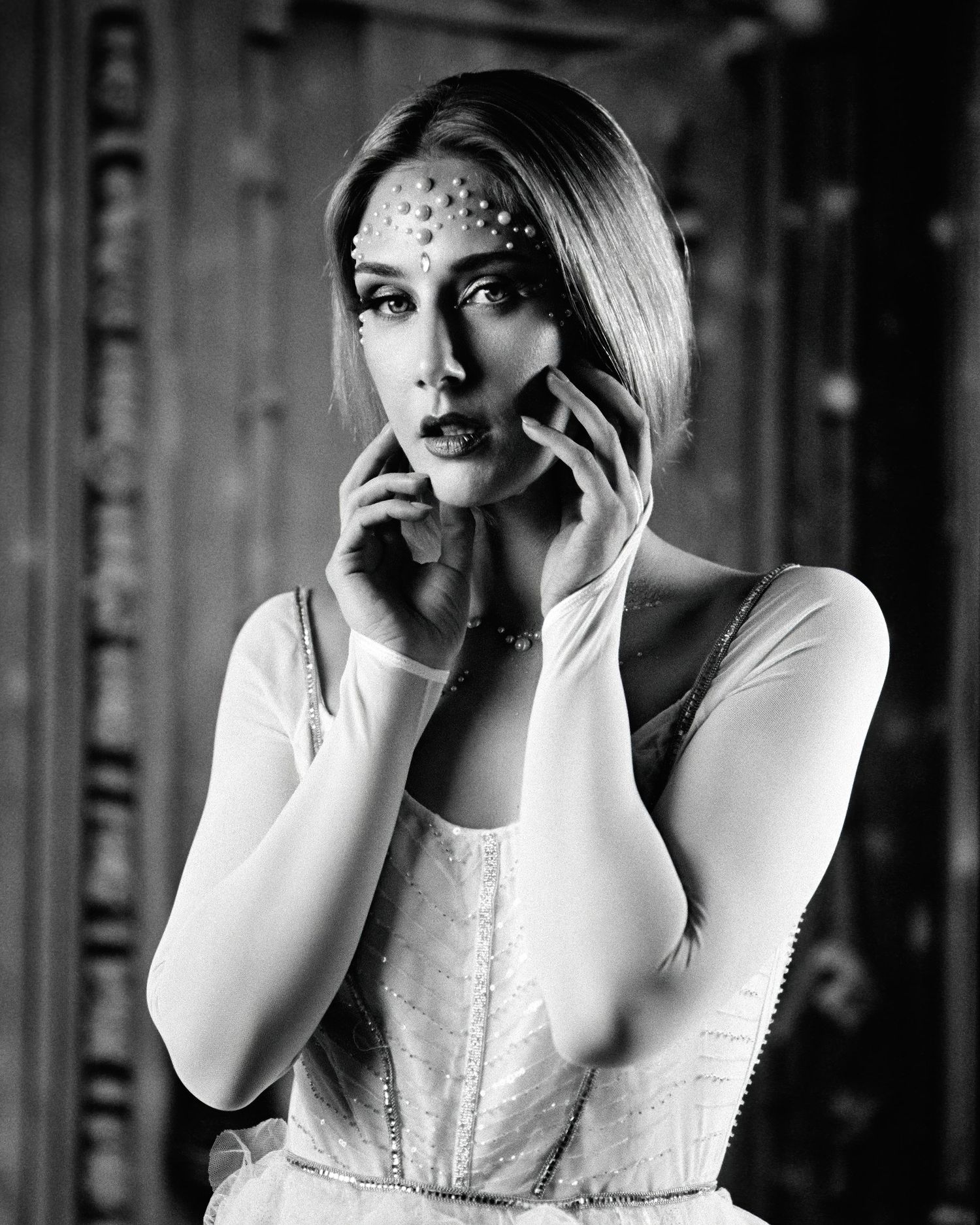 David G Holt Photography - Black and white portrait series showing dramatic emotional expressions in a classic studio setting.