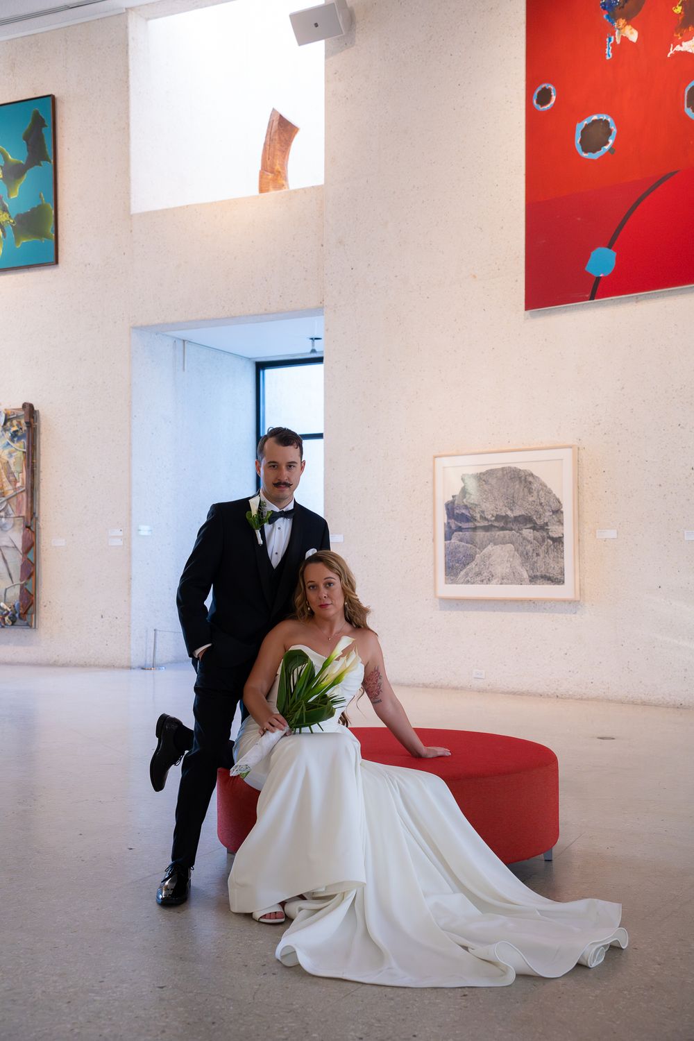 Newly married couple posing for wedding portraits outdoors in Corpus Christi, Texas.