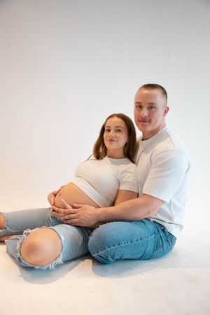 Studio maternity photos in Cincinnati, OH. Family photography by Faith's Flicks by Faith Rodriguez, Now booking 2026.