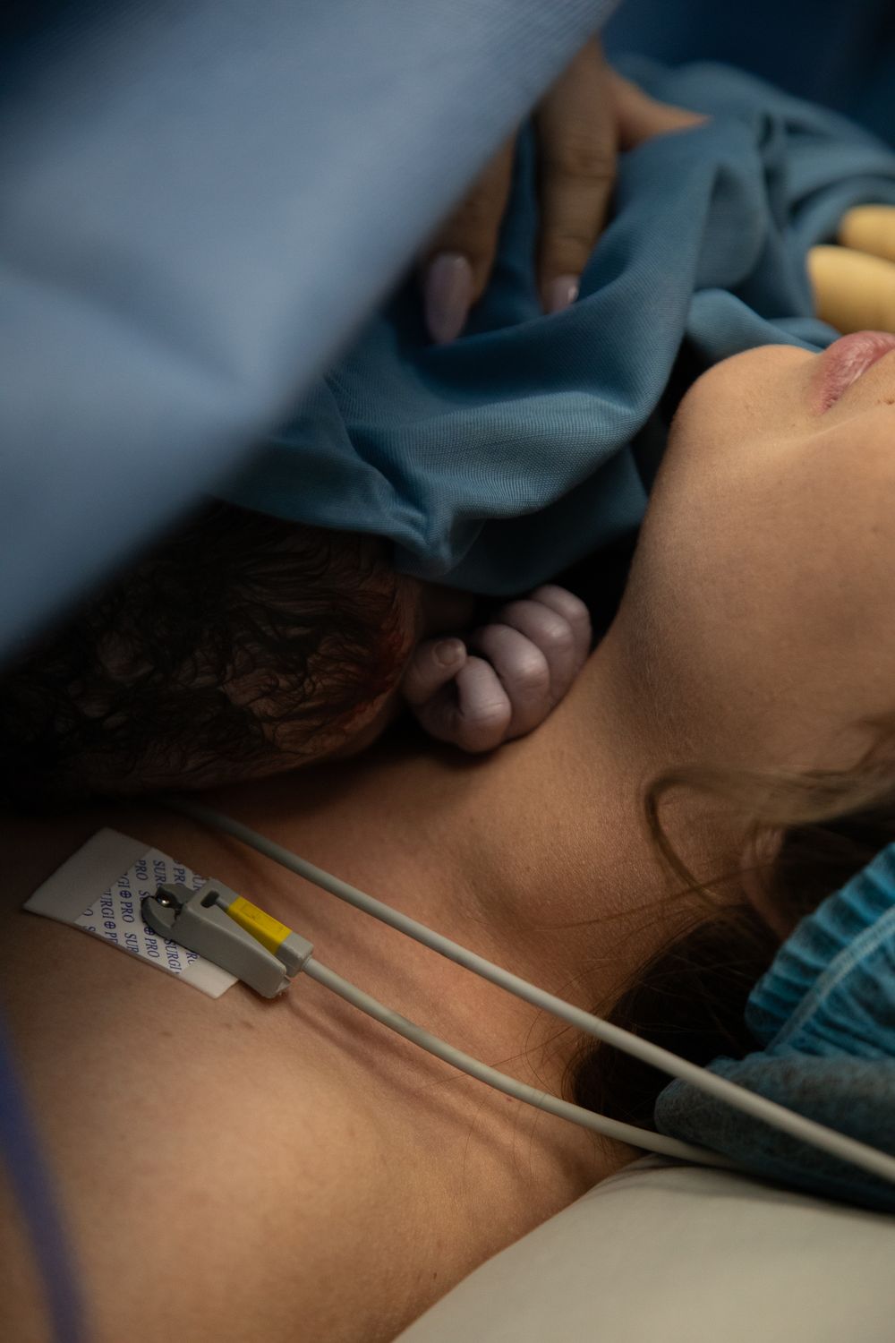 Emotional birth photography in Johannesburg showing skin-to-skin contact, newborn bonding, and the power of childbirth.