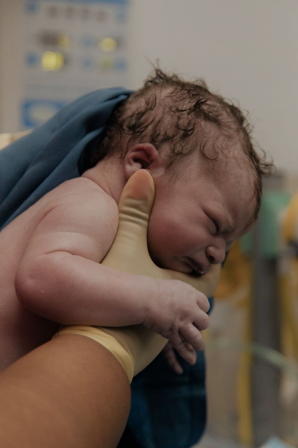 Emotional birth photography in Johannesburg showing skin-to-skin contact, newborn bonding, and the power of childbirth.