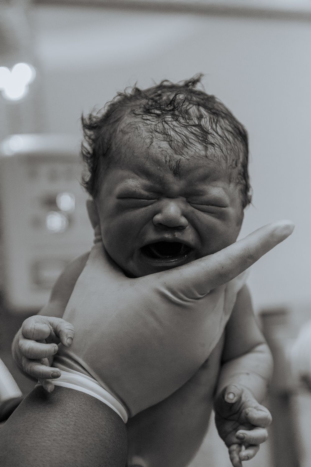 Emotional birth photography in Johannesburg showing skin-to-skin contact, newborn bonding, and the power of childbirth.