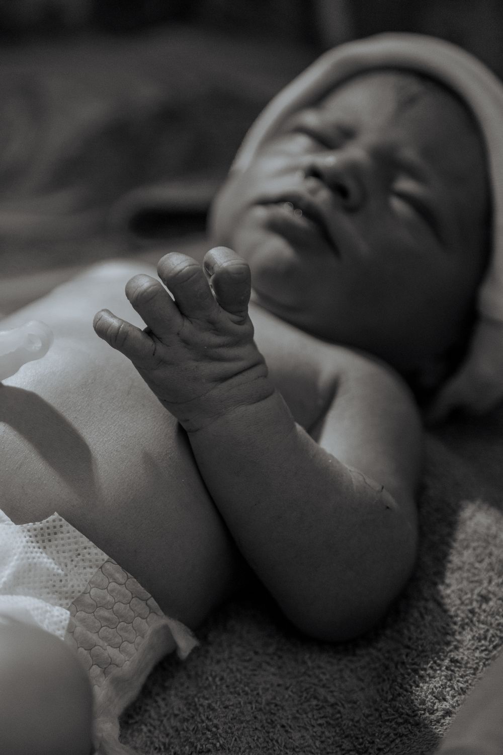 Emotional birth photography in Johannesburg showing skin-to-skin contact, newborn bonding, and the power of childbirth.