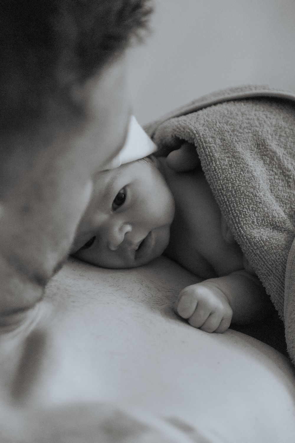 Emotional birth photography in Johannesburg showing skin-to-skin contact, newborn bonding, and the power of childbirth.