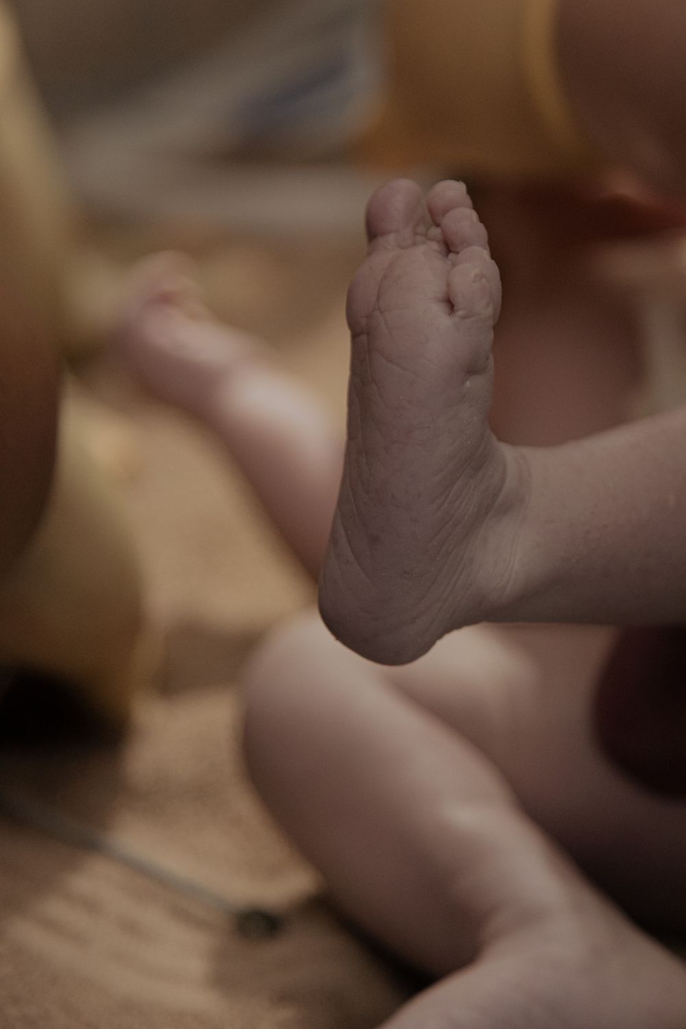 Emotional birth photography in Johannesburg showing skin-to-skin contact, newborn bonding, and the power of childbirth.
