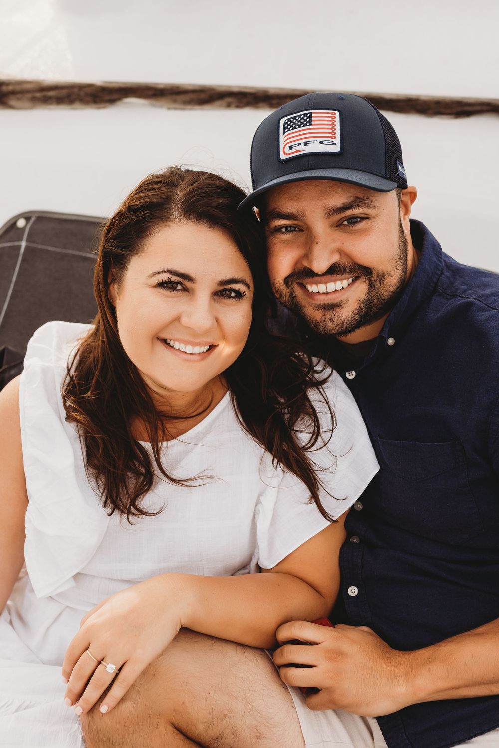 Surprise proposal on a boat near Honeymoon Island Florida with emotional reaction and ocean backdrop