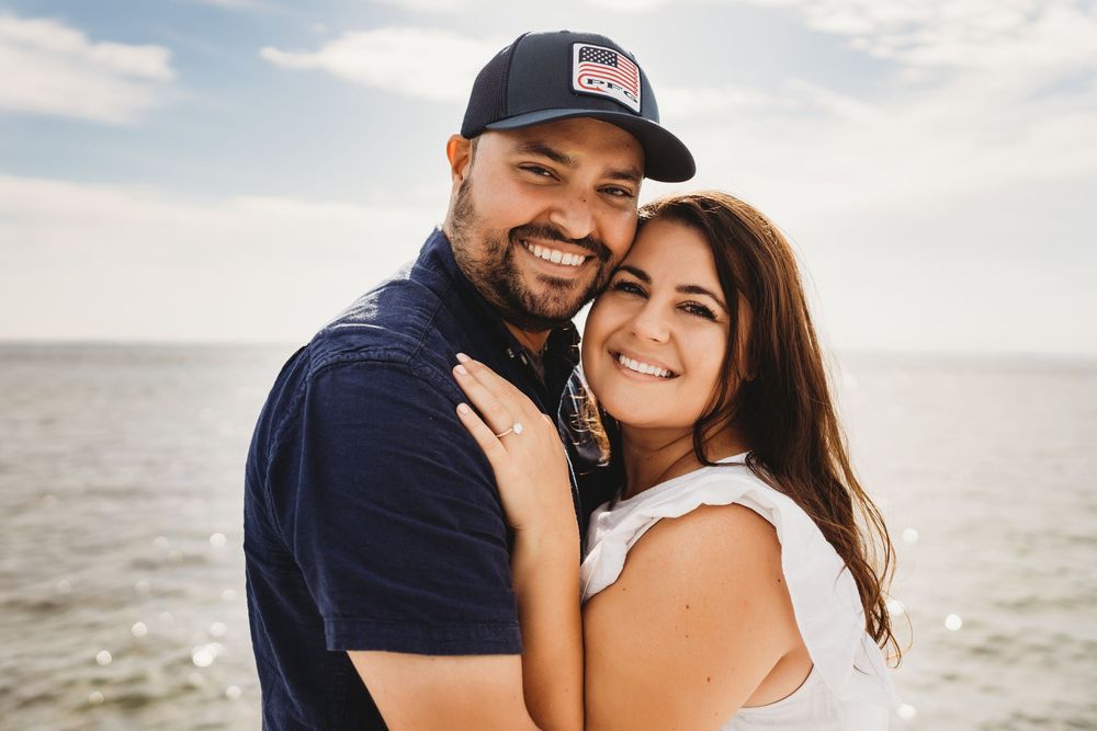 Boat engagement session following a surprise proposal off Honeymoon Island Florida