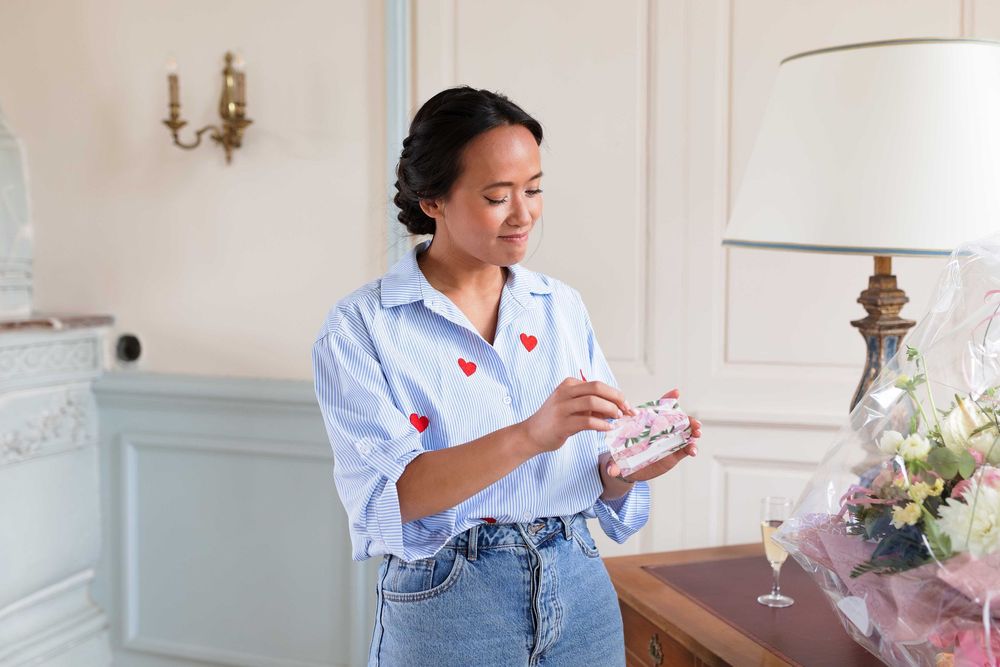 Casual brunch setting with light blue shirt and drinks.