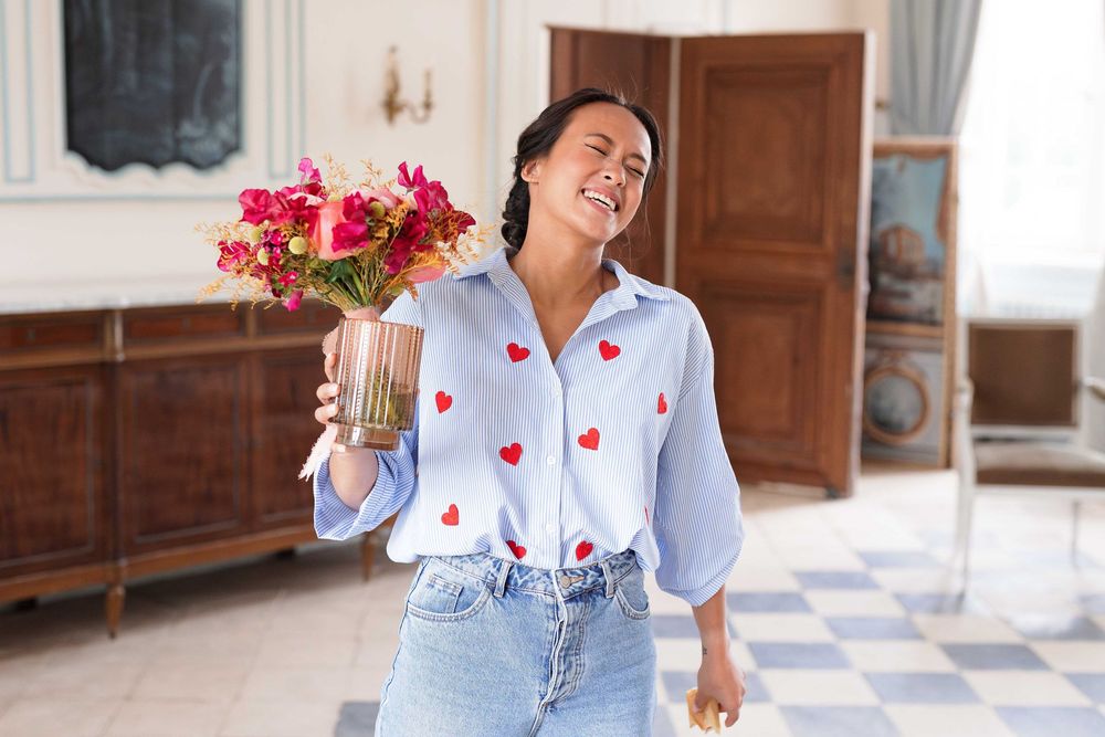 Light and airy room with heart-decorated shirt and casual styling.