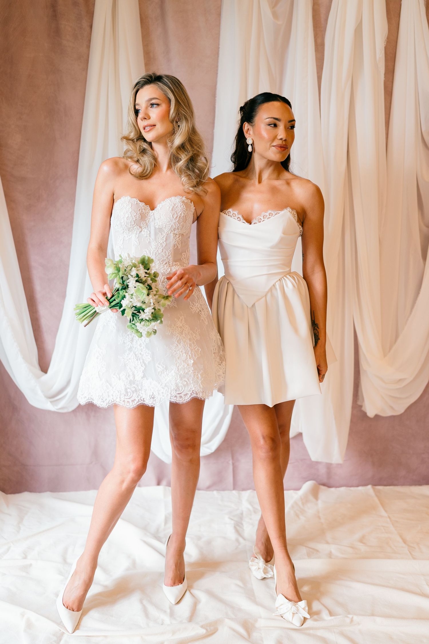 A series of artistic bridal portraits showing white wedding dresses against a draped fabric backdrop.