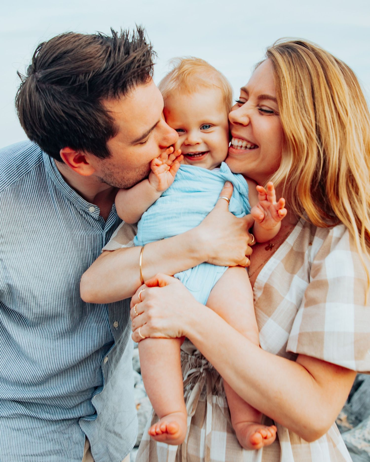 A joyful family moment captured in bright natural light.
