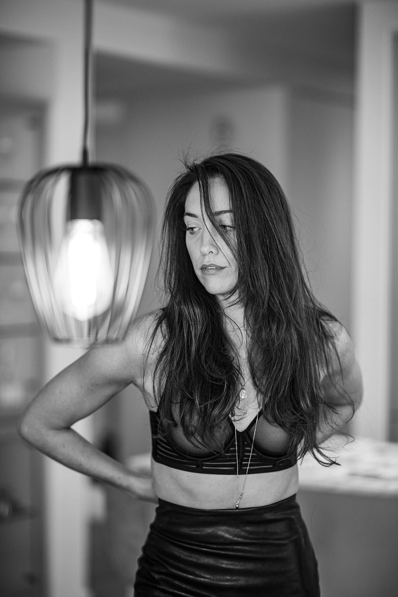 Dramatic black and white fashion portraits with movement and flowing hair.