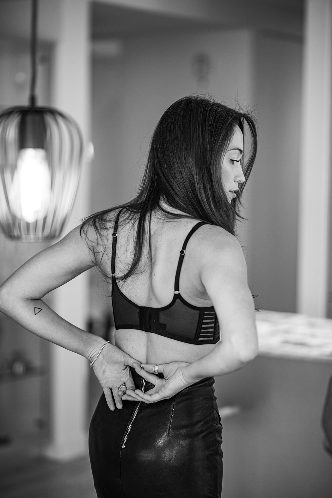 Black and white portrait series showing dynamic movement and poses in studio setting.