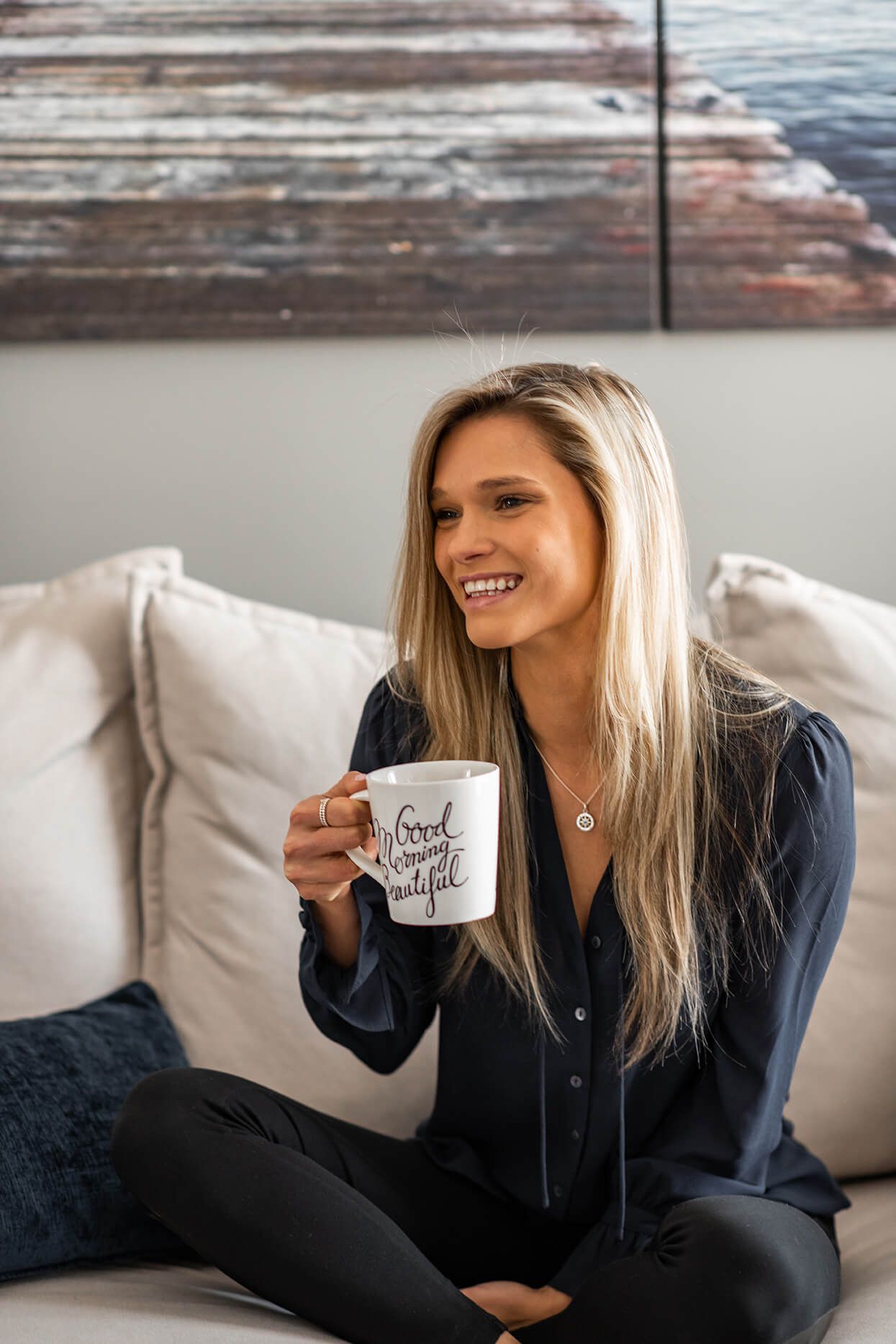 Casual indoor photos of someone enjoying coffee while sitting comfortably on a sofa.