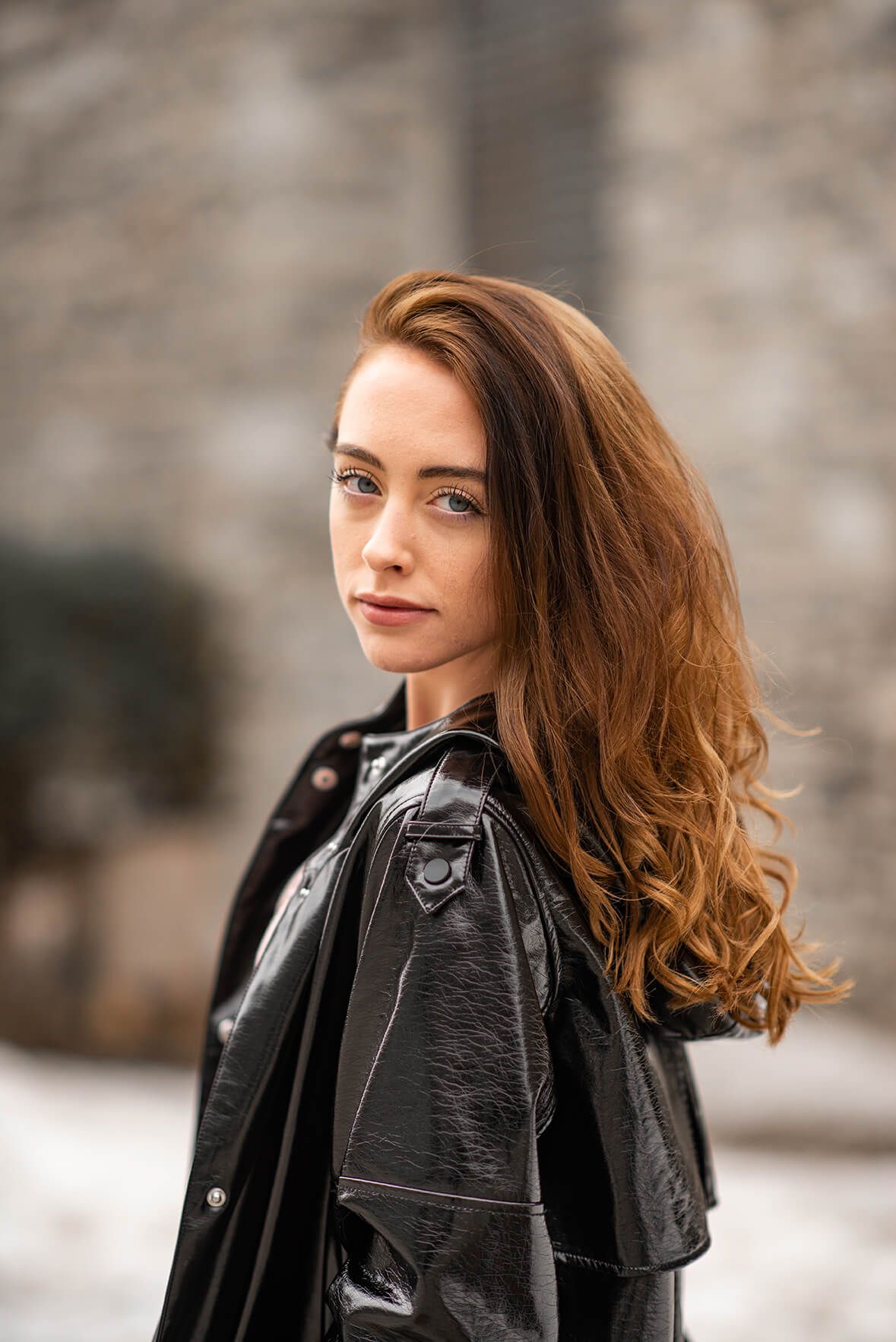 Portrait series featuring someone in a black leather jacket against a blurred background.