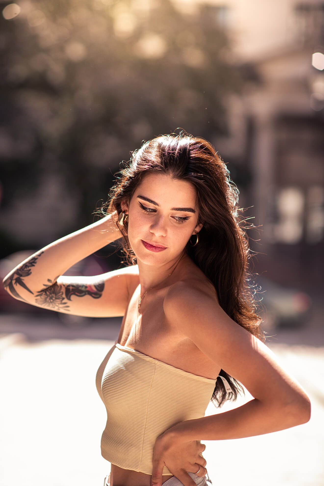 Soft focus portrait with natural lighting and neutral tones.