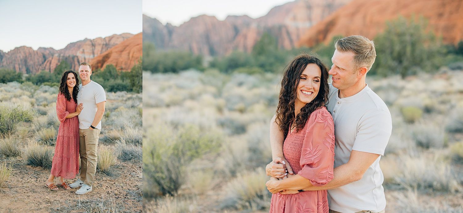 Scenic panoramic view of red rock cliffs and desert landscape during golden hour.