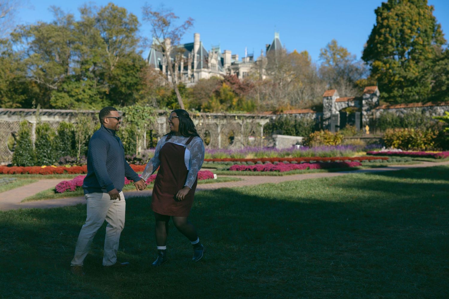 couples photoshoot biltmore estate asheville NC gardens fall flowers diverse inclusive couple