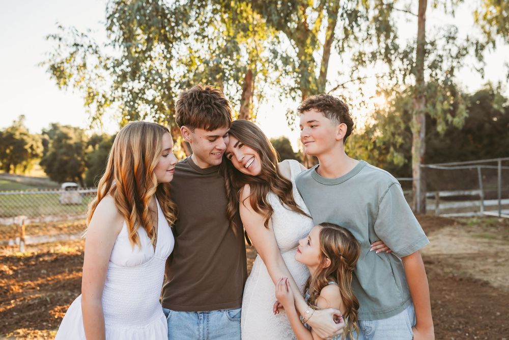 A family shares joyful moments together in a series of outdoor photos during golden hour sunset.