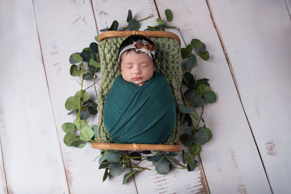 midland tx newborn photographer Midland TX newborn wrapped baby session photographers midland tx posed newborn baby bed newborn mini session