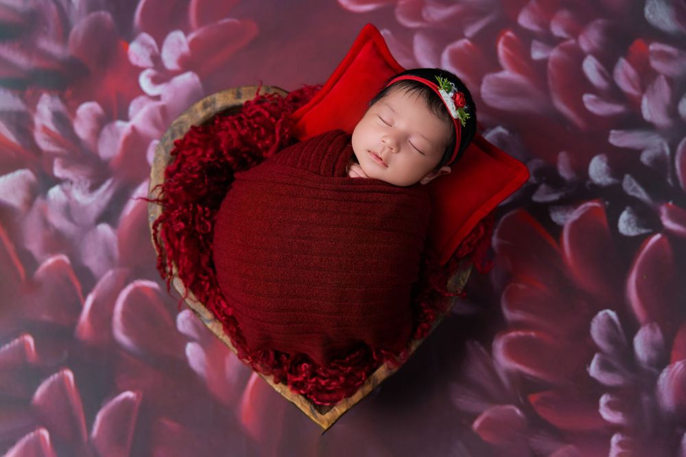 midland tx newborn photographer Midland TX newborn wrapped baby session photographers midland tx posed baby heart bowl newborn mini session